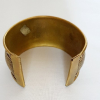 Goudkleurige slavenarmband